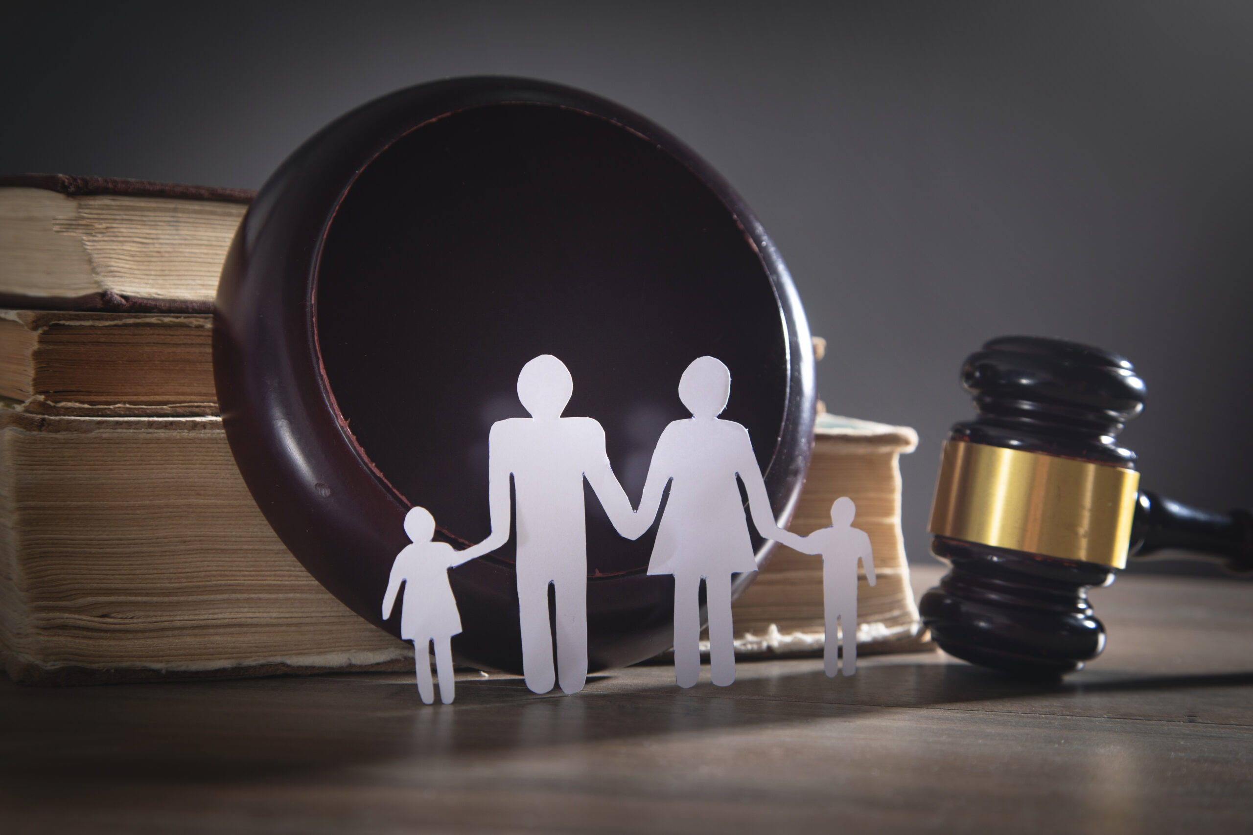 Paper cut family, judge gavel and book. Family Law